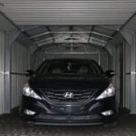 Duramax Imperial Metal Garage Dark Gray with White Trim 12×26 - Image 11